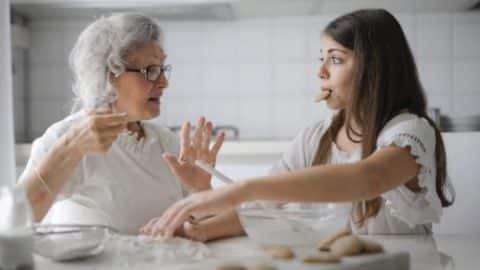 Teen girl interacts with her grandmother